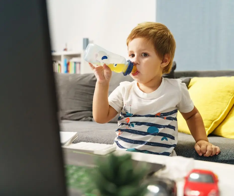 baby drinking juice